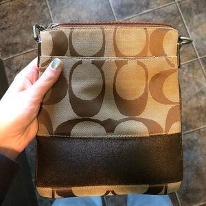 Women’s used coach side crossbody purse.
